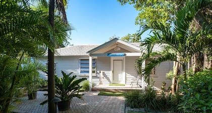 Tropical bayfront villa with sandy beach