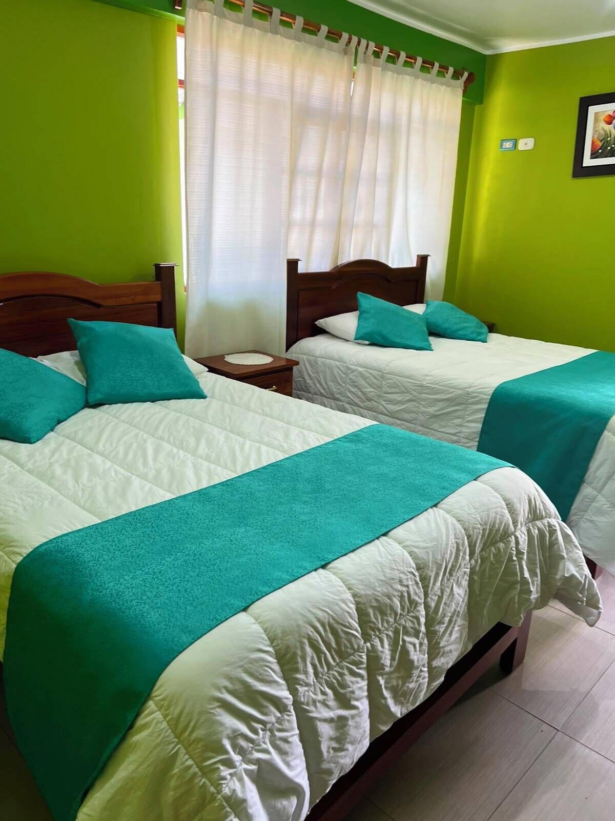 Premium bedding, down comforters, desk, laptop workspace