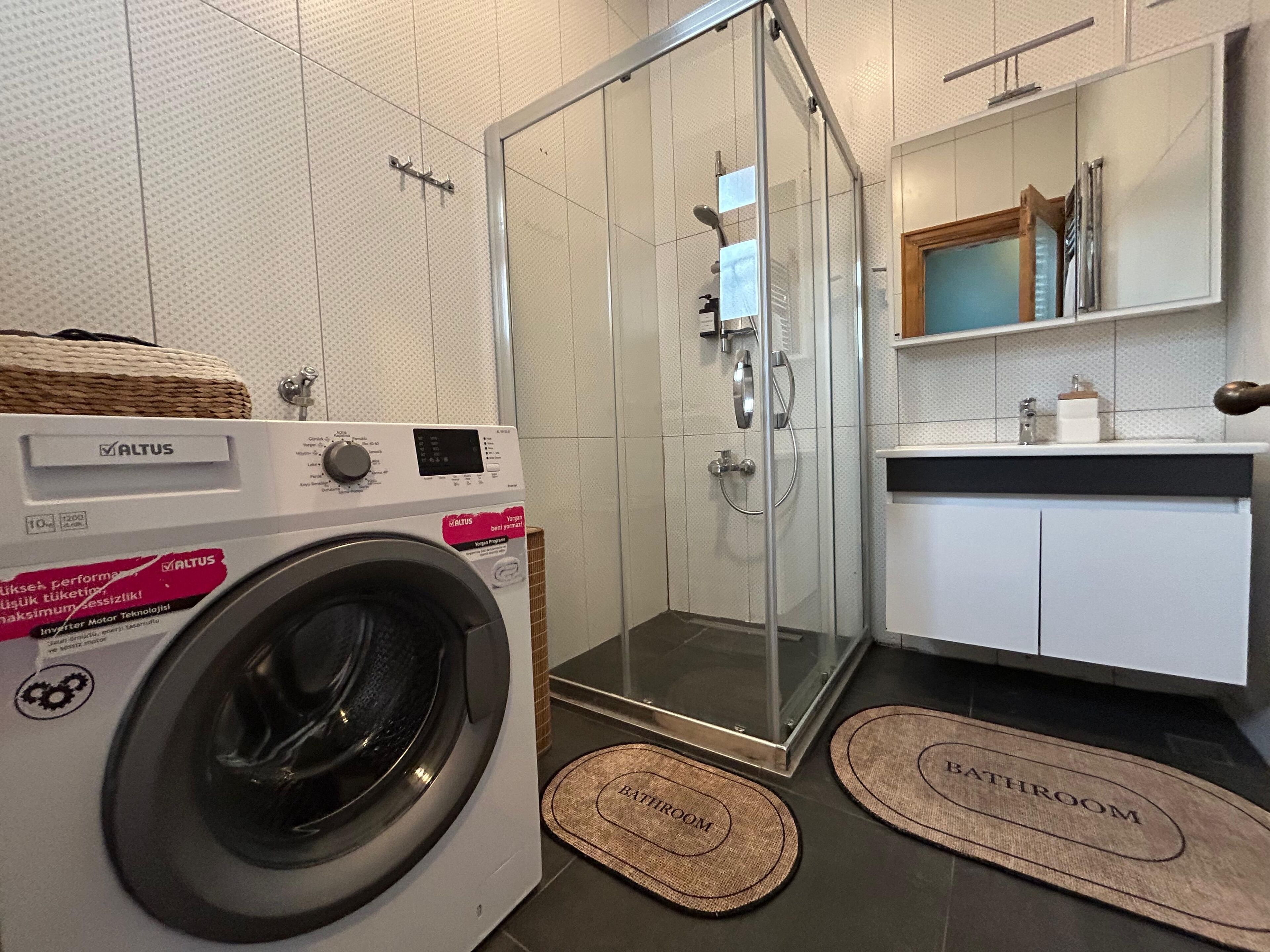 Hair dryer, bidet, towels, soap