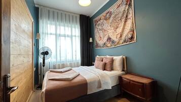 3 habitaciones, caja de seguridad en la habitación y escritorio