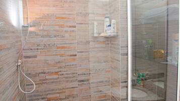 Standard Apartment | Bathroom | Hair dryer, towels