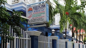 A signboard for Veli's Inn Boracay with contact details and location information. - Island Inn Boracay (Boracay Island)
