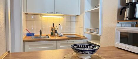 Fridge, microwave, coffee/tea maker, electric kettle