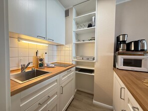 Fridge, microwave, coffee/tea maker, electric kettle