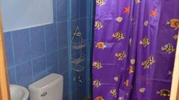 Een regendouche, handdoeken