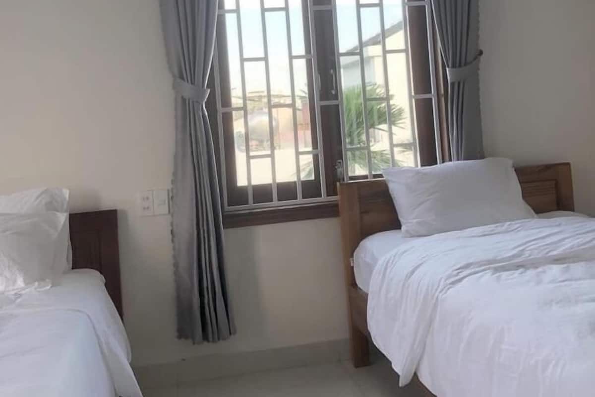 Standard Triple Room, Garden Area | Premium bedding, desk, laptop workspace, blackout drapes