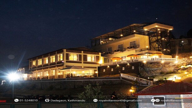 A multi-story hotel with a balcony and outdoor seating area, located on a hillside. - MeroStay 029 Royal Villa Resort (Tohka)