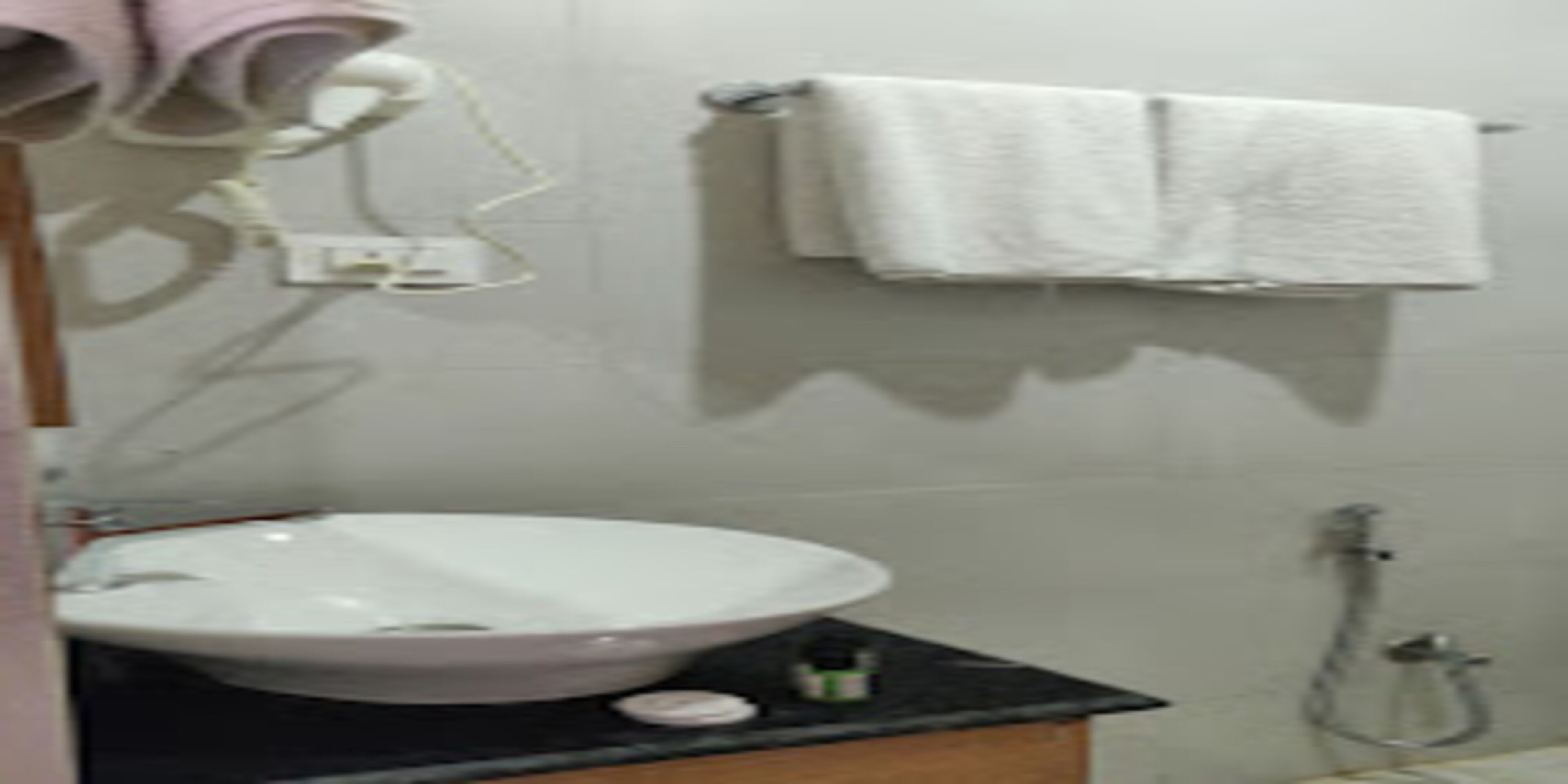 Shower, rainfall showerhead, towels, soap