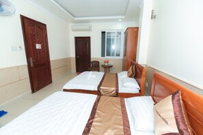 Desk, laptop workspace, free WiFi, bed sheets