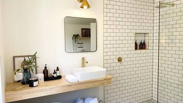 Shower, hair dryer, towels, soap