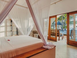 Villa familiar, 2 habitaciones, Aire acondicionado, frente a la playa (Zawadi) | Caja fuerte, decoración individual, escritorio