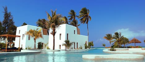 Outdoor pool, pool umbrellas, sun loungers