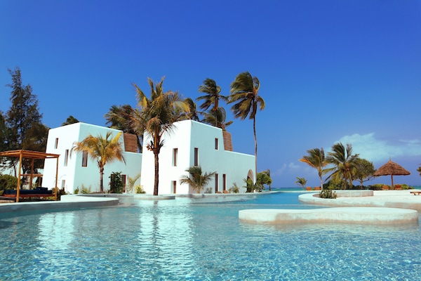 Outdoor pool, pool umbrellas, sun loungers