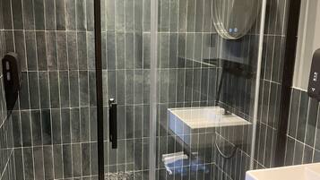 Hair dryer, towels, soap, shampoo