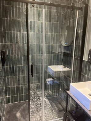 Hair dryer, towels, soap, shampoo