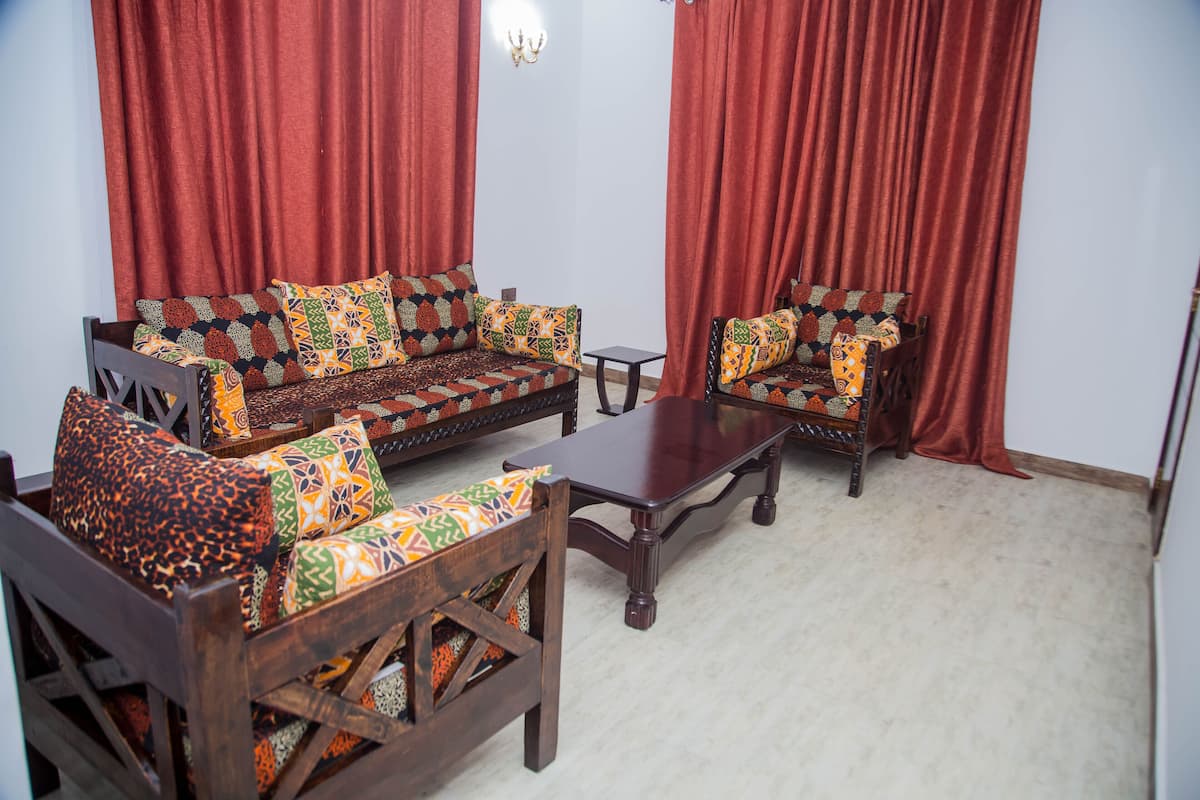 Family Apartment | 1 bedroom, in-room safe, blackout drapes, iron/ironing board