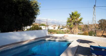 Rural house with pool. Views of the sea and the mountains.