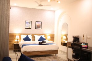Suite Studio Luxe, non-fumeurs, vue ville | Draps en coton égyptien, literie de qualité supérieure