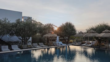 Outdoor pool, pool umbrellas, pool loungers