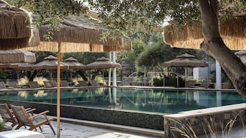 Outdoor pool, pool umbrellas, pool loungers