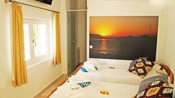 2 bedrooms, individually decorated, blackout curtains, soundproofing