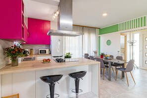 Family Villa, Multiple Beds (Pool Villa May) | Private kitchen | Fridge, microwave, oven, stovetop