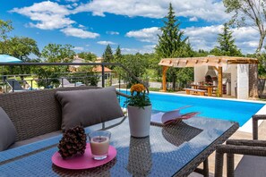 Seasonal outdoor pool, a heated pool