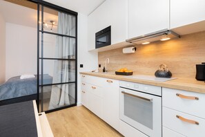 Apartment, 1 Bedroom, Terrace, Garden View | Private kitchen | Microwave, dishwasher, coffee/tea maker, electric kettle - Butterfly Apartment by Renters (Gdansk)
