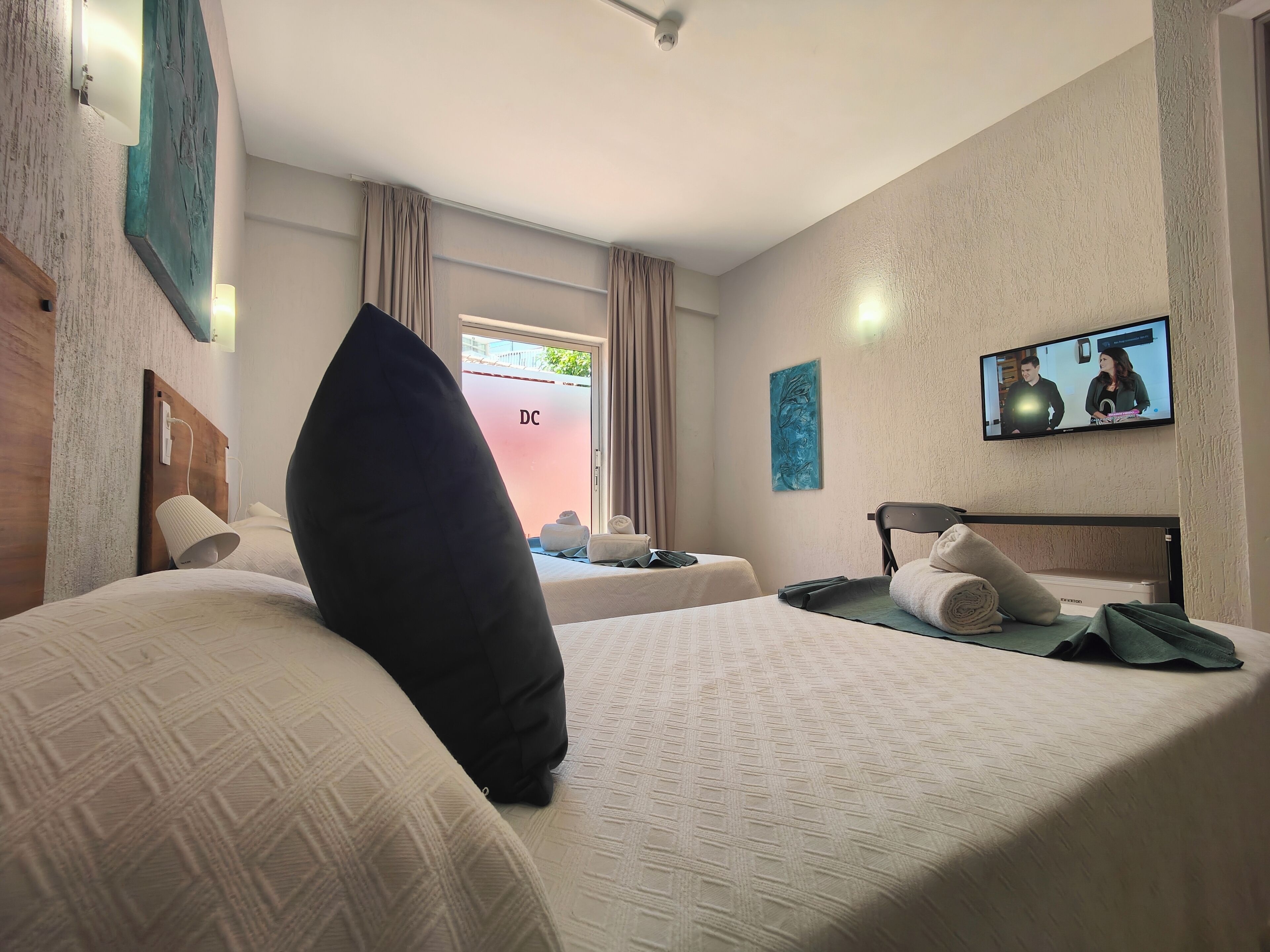 Superior Triple Room | Memory-foam beds, desk, laptop workspace, blackout curtains