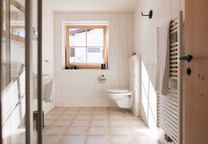 Shower, hair dryer, toilet paper