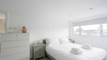 Basic House, Multiple Beds | 4 bedrooms, laptop workspace, bed sheets