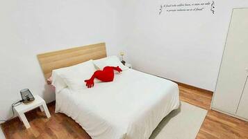 2 dormitorios, escritorio, tabla de planchar con plancha y wifi gratis