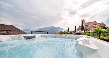 Appartement "Apt. Dora - Schenna Chalet" avec vue sur la montagne, terrasse privée et Wi-Fi