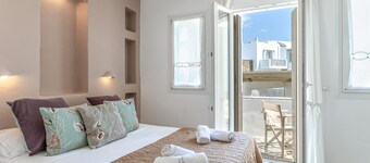 'Ninemia Suites Tinos Superior 101' avec piscine partagée, Wi-Fi et climatisation