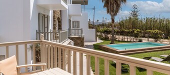 Apartment In A Hotel 'Ninemia Suites Tinos Grand 105' with Shared Pool, Wi-Fi and Air Conditioning