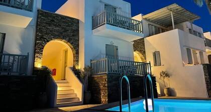 'Ninemia Suites Tinos Grand 105' mit gemeinsamem Pool, WLAN und Klimaanlage