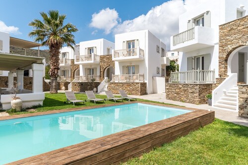 Apartment In A Hotel 'Ninemia Suites Tinos Grand 105' with Shared Pool, Wi-Fi and Air Conditioning