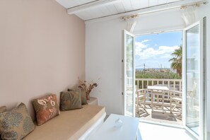 TV - Apartment In A Hotel 'Ninemia Suites Tinos Grand 205' with Sea View, Wi-Fi and Air Conditioning (tinos)