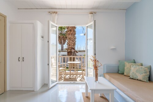 Apartment In A Hotel 'Ninemia Suites Tinos Grand 104' with Shared Pool, Wi-Fi and Air Conditioning
