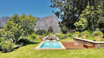 Outdoor pool, pool umbrellas, sun loungers
