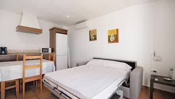 1 chambre, fer et planche Ă repasser, Wi-Fi gratuit, draps fournis