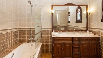 Bathtub, hair dryer, towels
