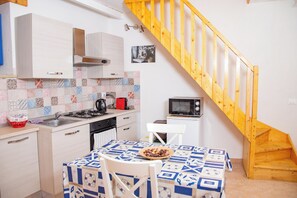 Family Apartment, 1 Bedroom, Sea Facing (Casa Demetra 200m from sea) | Private kitchen | Fridge, microwave, oven, stovetop