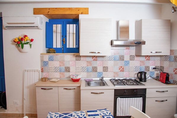 Family Apartment, 1 Bedroom, Sea Facing (Casa Demetra 200m from sea) | Private kitchen | Fridge, microwave, oven, stovetop
