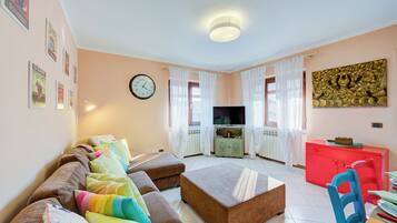 21-inch flat-screen TV with cable channels, TV