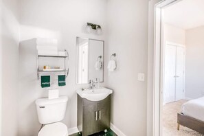 Bathtub, hair dryer, towels