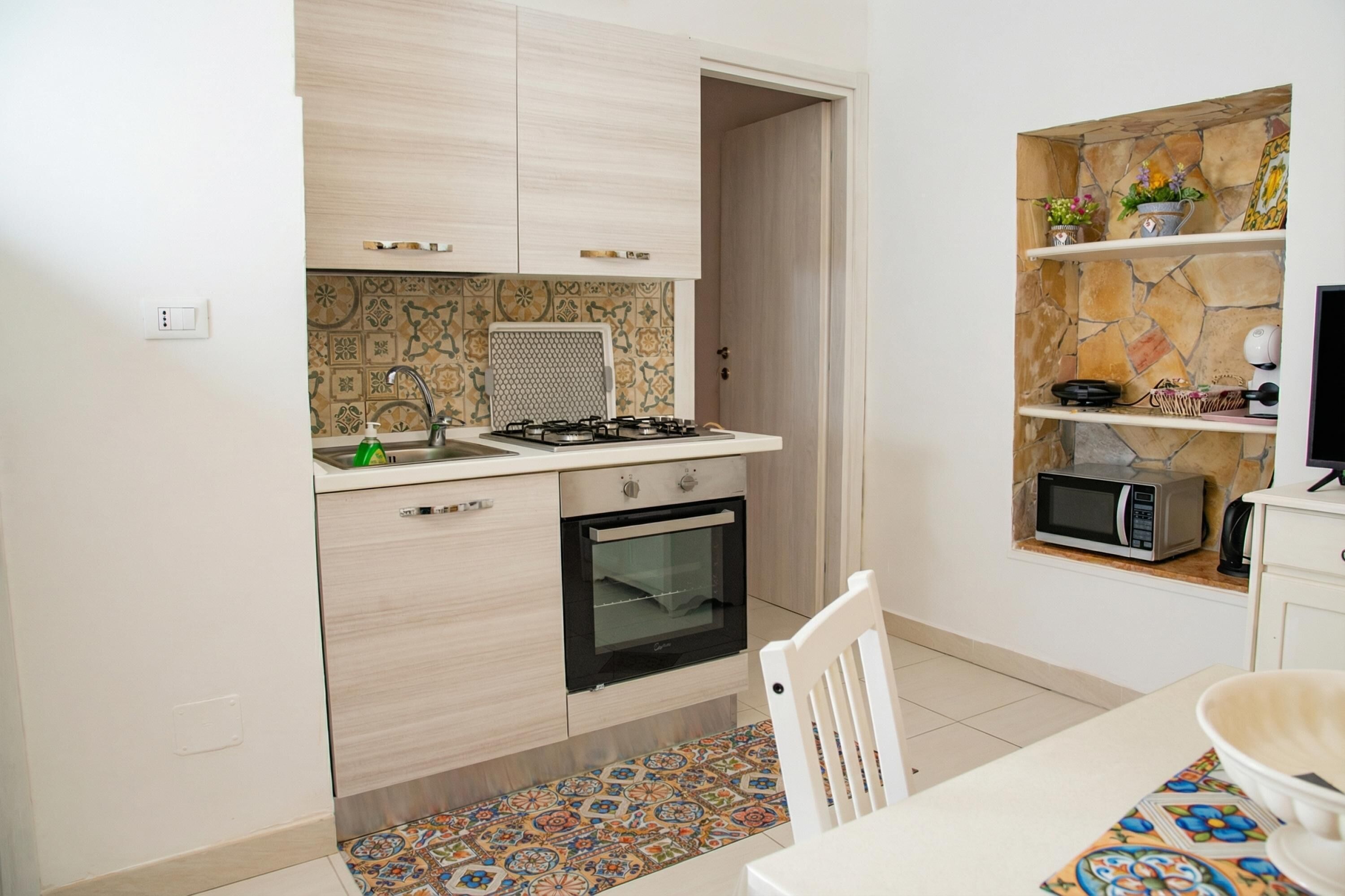 Family Studio, Sea Facing (Nike Home 200m From Sea) | Private kitchen | Fridge, microwave, oven, stovetop