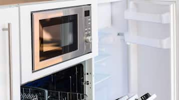 Fridge, coffee/tea maker, cookware/dishes/utensils