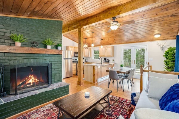 Read a book in our living room by the fireplace