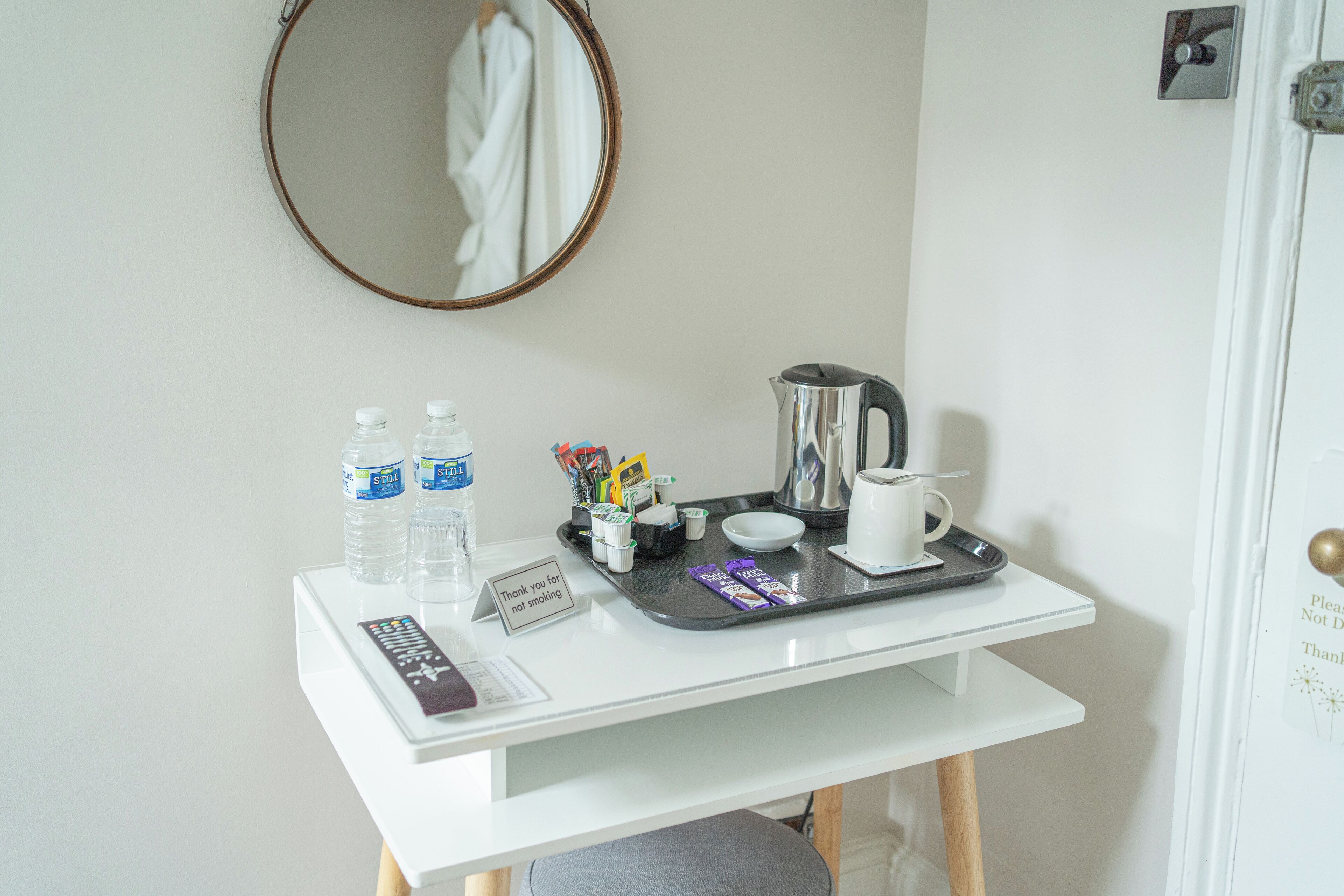 Desk, laptop workspace, blackout curtains, iron/ironing board
